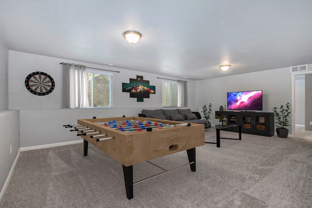 game room with light carpet