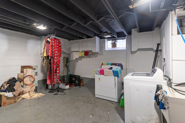 basement featuring separate washer and dryer