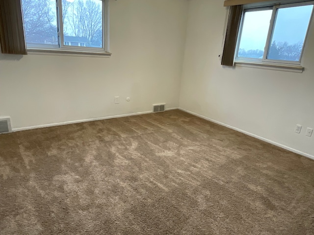 view of carpeted spare room