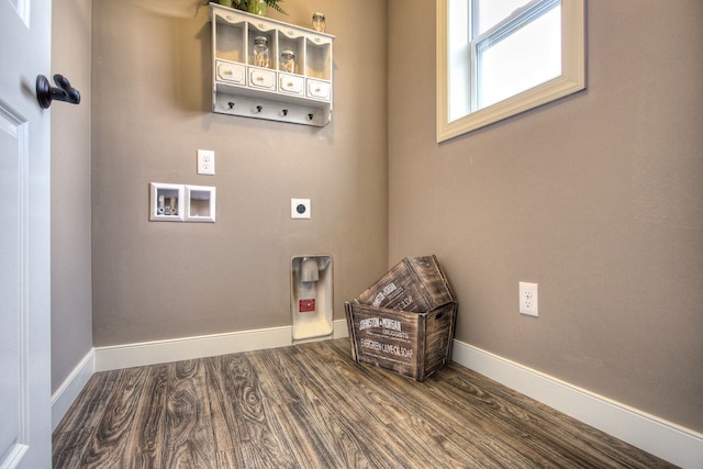 clothes washing area featuring hardwood / wood-style flooring, electric dryer hookup, and washer hookup