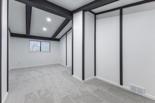 unfurnished bedroom with visible vents, beamed ceiling, recessed lighting, carpet, and baseboards