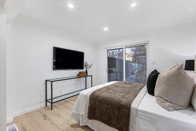 bedroom featuring access to exterior, visible vents, recessed lighting, and wood finished floors