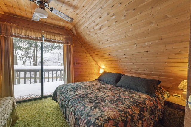 carpeted bedroom with wooden walls, vaulted ceiling, ceiling fan, access to exterior, and wood ceiling