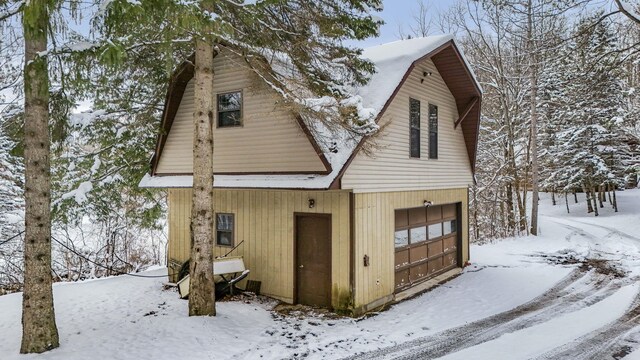 exterior space featuring a garage