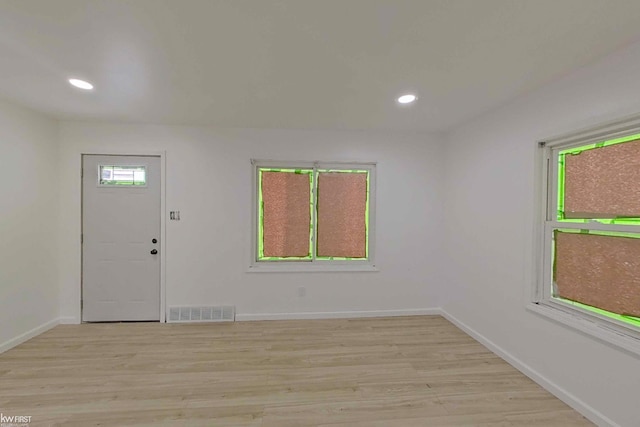 entryway with light hardwood / wood-style floors