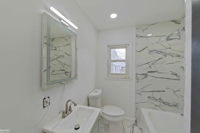 full bathroom featuring toilet, tiled shower / bath, and sink