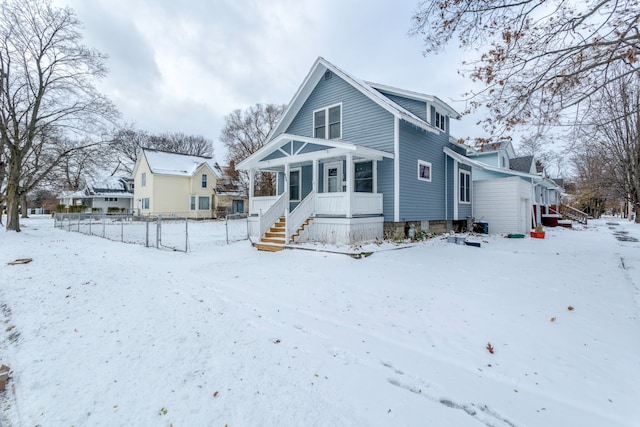 view of snow covered house