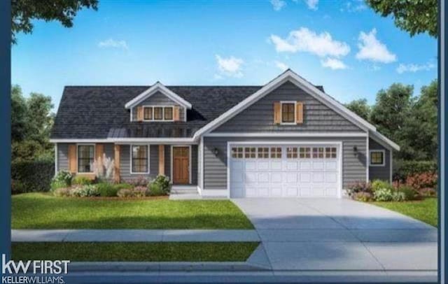 view of front of house with a garage and a front yard