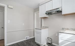 washroom featuring dark hardwood / wood-style flooring