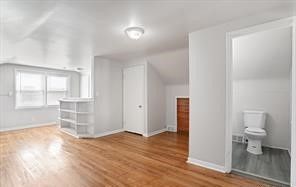 bonus room featuring hardwood / wood-style flooring