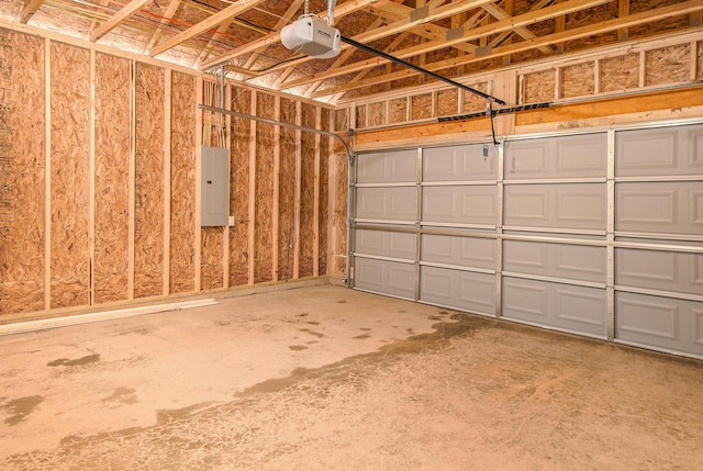 8775 E Sturtevant Ave, Richland, MI 49083 - garage featuring a garage door opener and electric panel