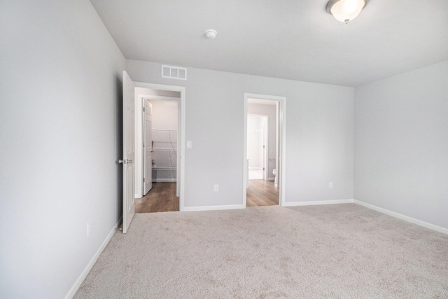 8775 E Sturtevant Ave, Richland, MI 49083 - unfurnished bedroom with carpet floors and baseboards