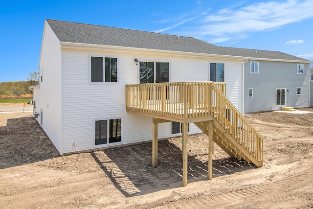 8775 E Sturtevant Ave, Richland, MI 49083 - back of property featuring a deck, stairway, and roof with shingles