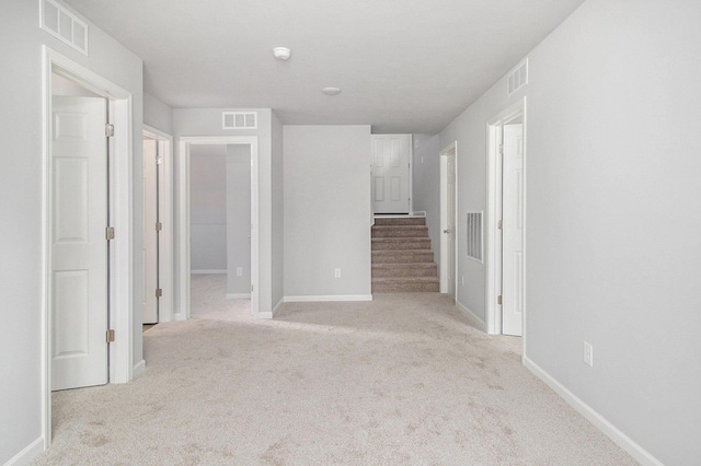 8775 E Sturtevant Ave, Richland, MI 49083 - carpeted spare room with baseboards, a smoke detector, and stairway