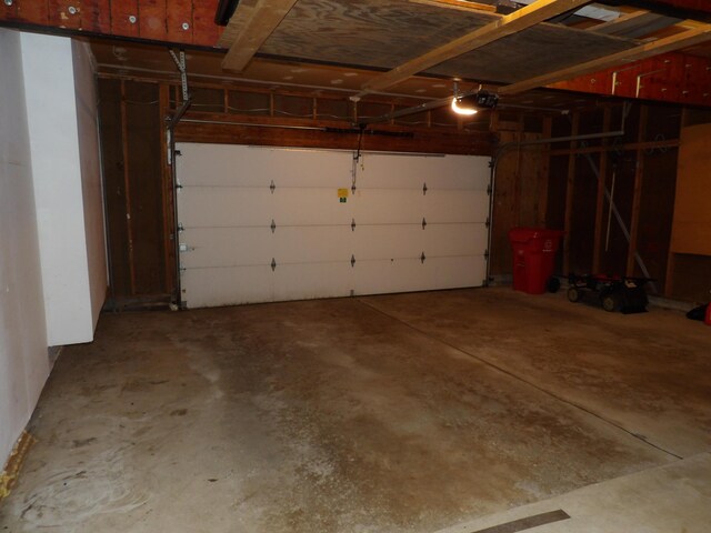 7335 Colony Dr, West Bloomfield, MI 48323 - garage with a garage door opener
