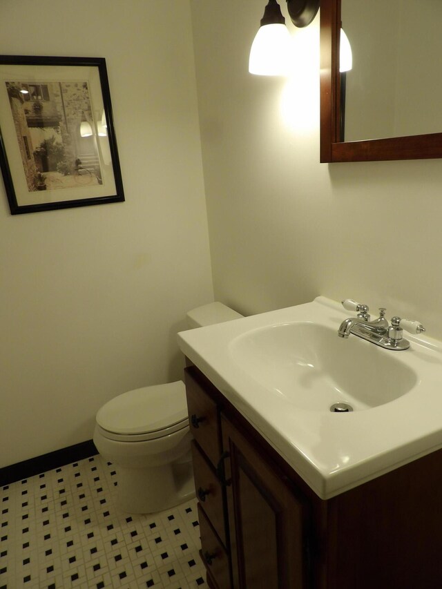 7335 Colony Dr, West Bloomfield, MI 48323 - bathroom with tile patterned flooring, vanity, and toilet