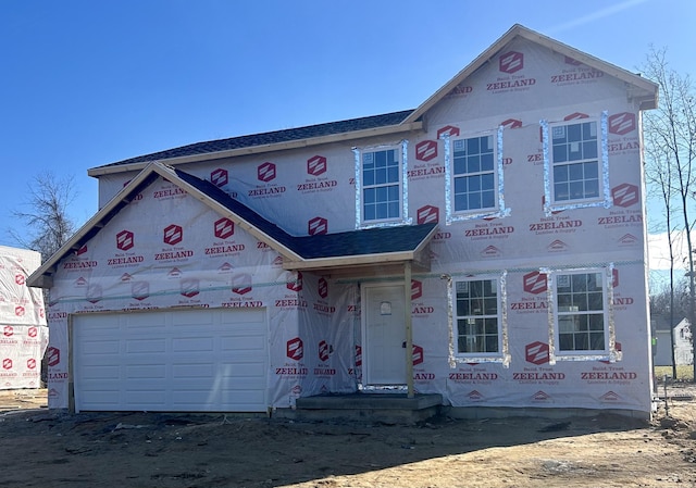 property in mid-construction featuring a garage