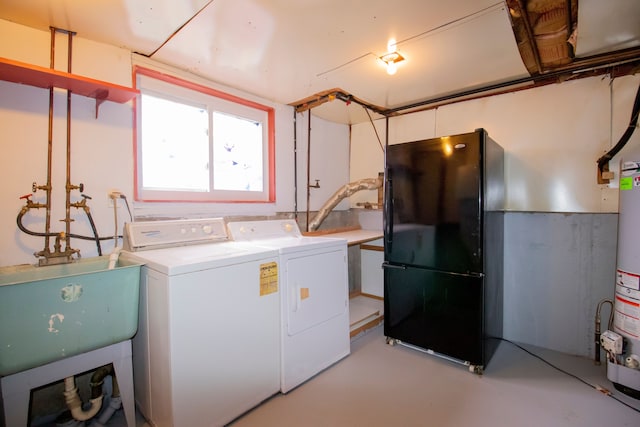 laundry area featuring washer and dryer and sink