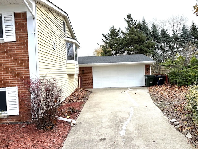 view of property exterior featuring a garage