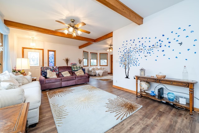 living room with beam ceiling, ceiling fan, and dark wood-type flooring