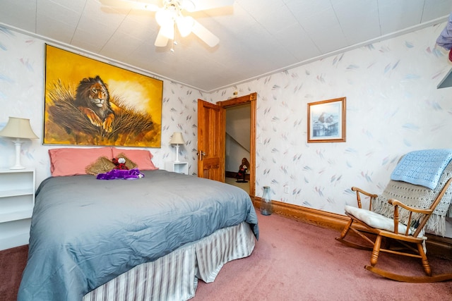bedroom featuring ceiling fan, crown molding, and carpet floors