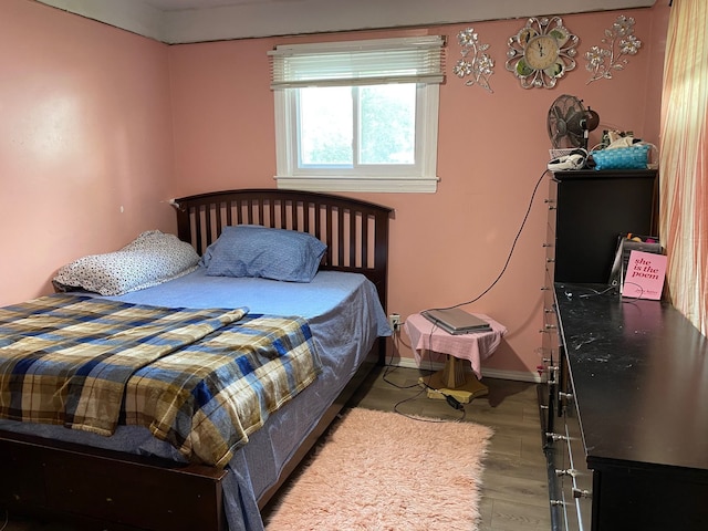 bedroom featuring hardwood / wood-style floors