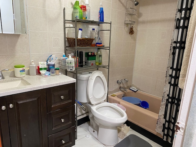 full bathroom with backsplash, toilet, shower / bath combo with shower curtain, vanity, and tile walls