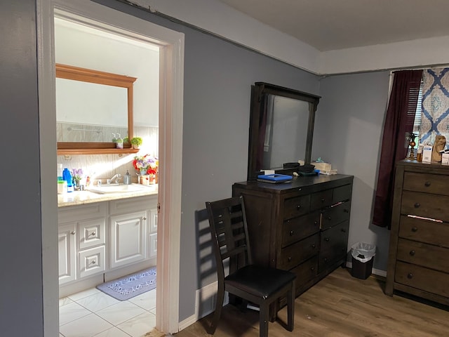 interior space with wood-type flooring and vanity