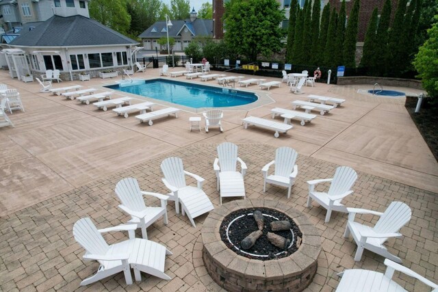 200 Lake St Unit 3B, Saint Joseph, MI 49085 - community pool with an outdoor fire pit and a patio area