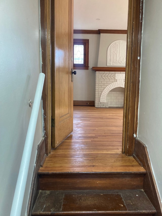 3918 Nottingham Rd, Detroit, MI 48224 - stairway with crown molding and wood finished floors