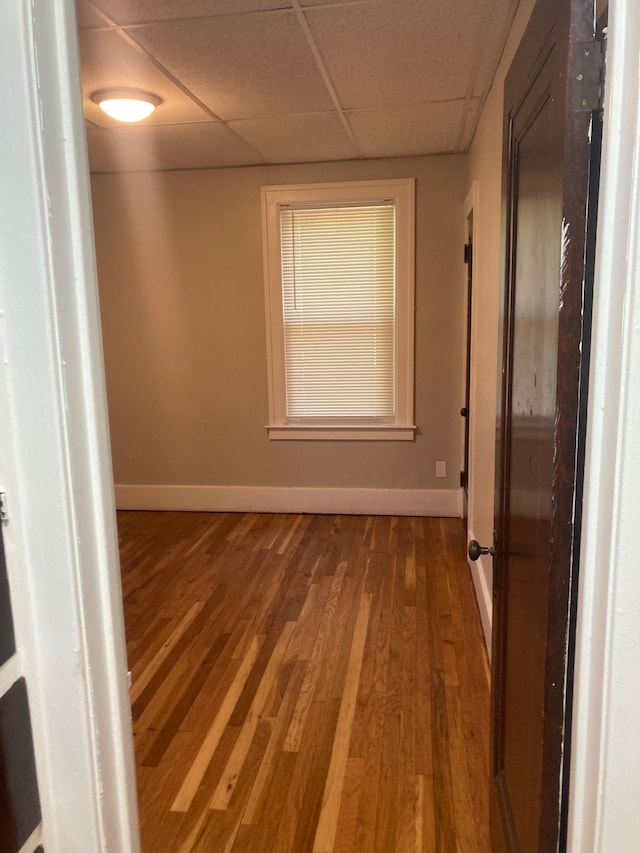 3918 Nottingham Rd, Detroit, MI 48224 - spare room featuring wood finished floors and a paneled ceiling
