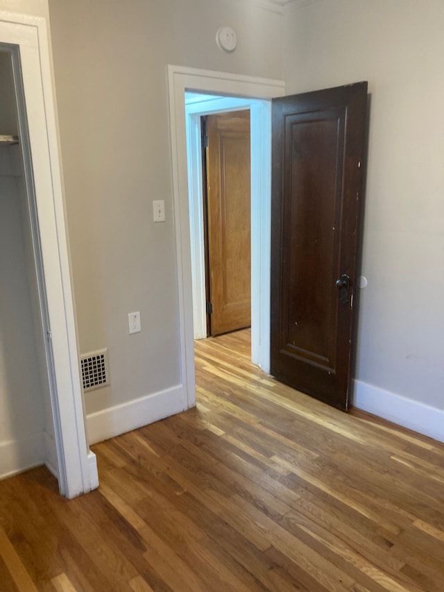 unfurnished bedroom featuring light hardwood / wood-style flooring