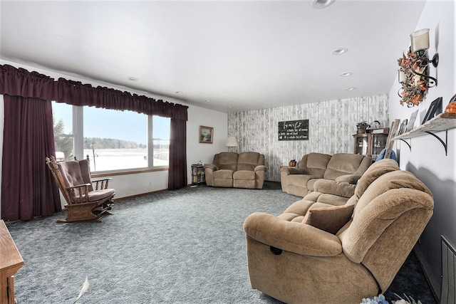 7580 River Rd, Evart, MI 49631 - carpeted living room with an accent wall, baseboards, wallpapered walls, and a water view