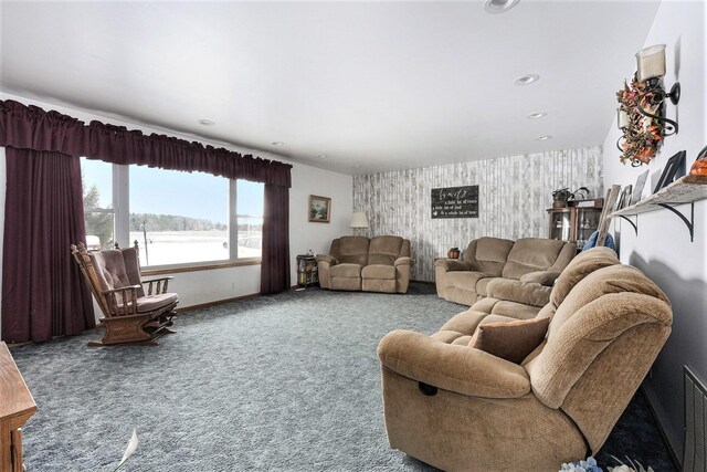 7580 River Rd, Evart, MI 49631 - carpeted living area featuring an accent wall, wallpapered walls, and a water view