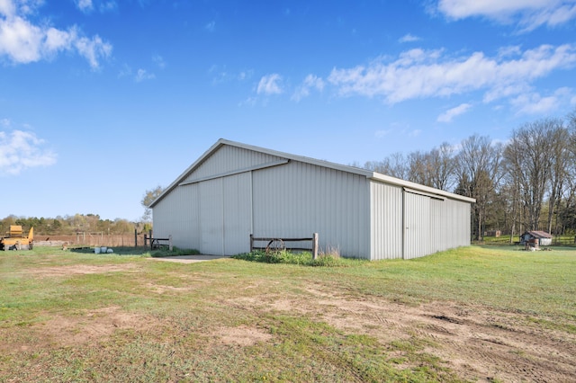 7580 River Rd, Evart, MI 49631 - view of pole building with a yard