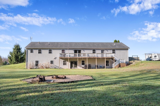 7580 River Rd, Evart, MI 49631 - rear view of property with a wooden deck, a yard, and stairway