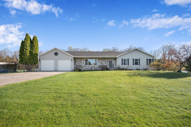 7580 River Rd, Evart, MI 49631 - ranch-style house with an attached garage, driveway, and a front lawn