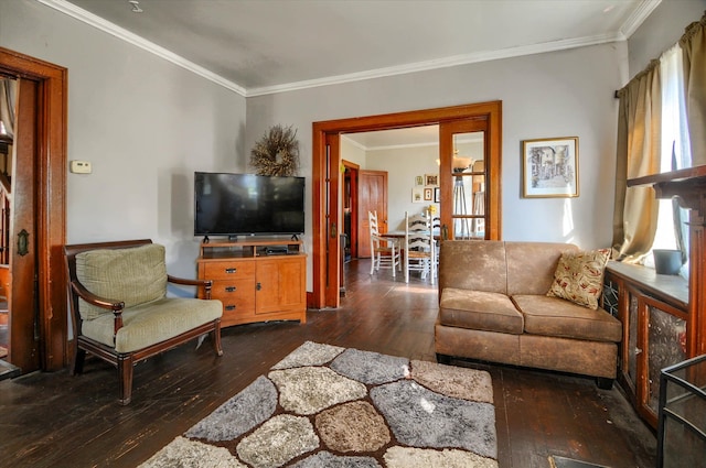 living room featuring dark hardwood / wood-style flooring and crown molding