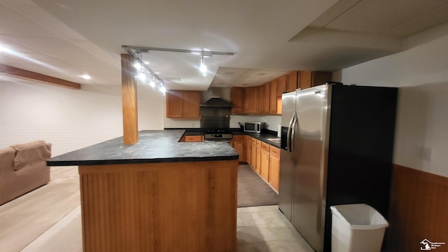 26926 Reaume, Trenton, MI 48183 - kitchen with stainless steel appliances, wall chimney exhaust hood, dark countertops, and a peninsula