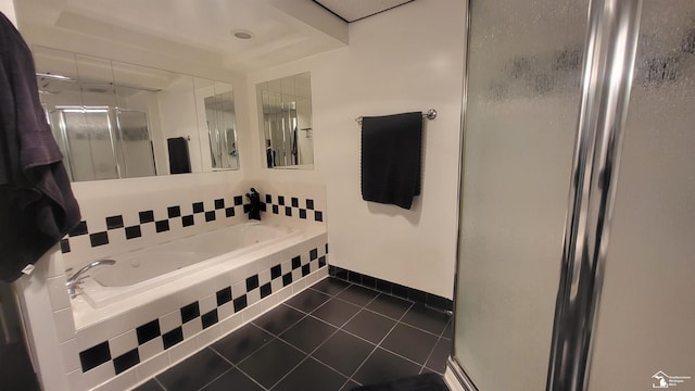 bathroom with tile patterned flooring and plus walk in shower