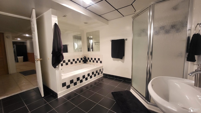 bathroom featuring tile patterned flooring, sink, and separate shower and tub