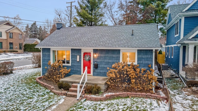 view of front of home featuring central AC unit