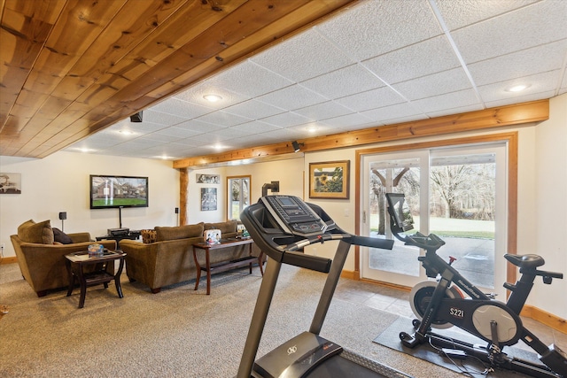 workout area with a paneled ceiling