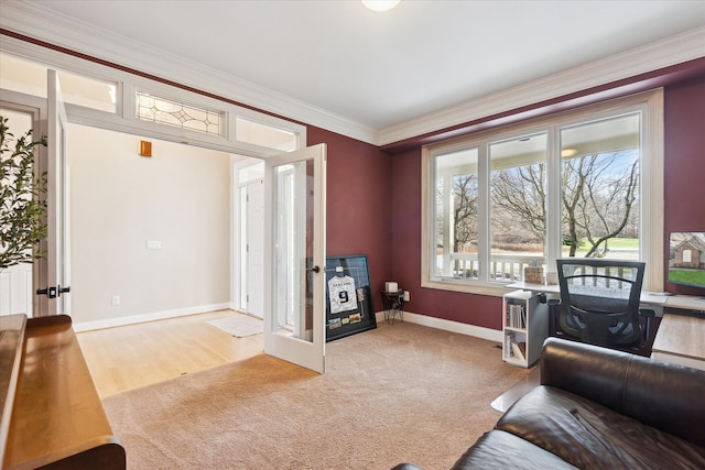 interior space with light hardwood / wood-style flooring, french doors, and ornamental molding