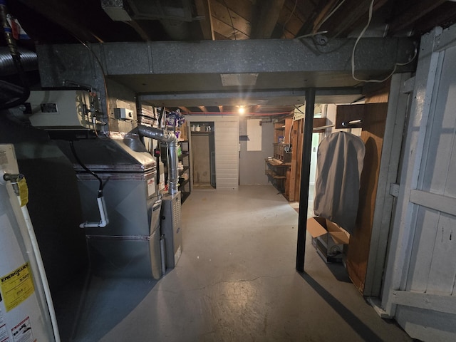 basement featuring gas water heater