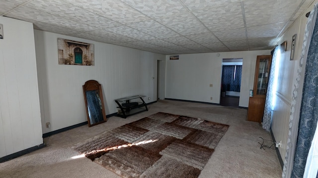 2521 Hillside Dr NW, Grand Rapids, MI 49544 - below grade area with carpet flooring and baseboards