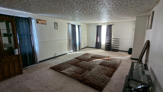 2521 Hillside Dr NW, Grand Rapids, MI 49544 - carpeted living room featuring baseboards