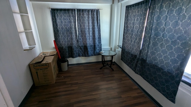 2521 Hillside Dr NW, Grand Rapids, MI 49544 - spare room with dark wood-style flooring