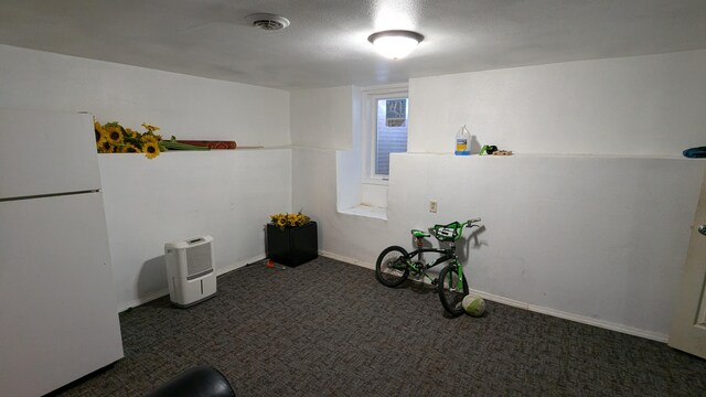 2521 Hillside Dr NW, Grand Rapids, MI 49544 - carpeted empty room with baseboards