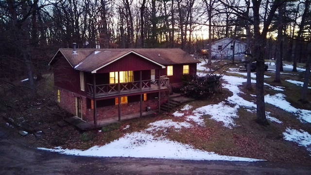 view of front of house with a balcony